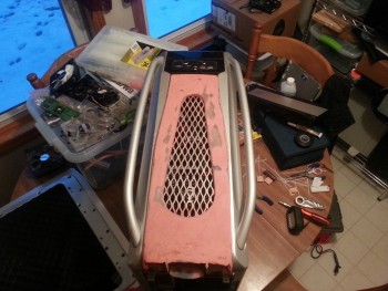 I modified the top panel of the case to allow me to mount fans on the outside portion, I need to build up the rear section some more and then taper the edges and pain this this spring/summer when it is warm.