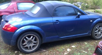 Not a huge fan of the aftermarket 18&quot; rims, but they are okay.  Stock looked nicer though...<br />Nestled here between two of my Pontiac F-Bodies, it looks not-too-small, cutish, and terribly modern to me.