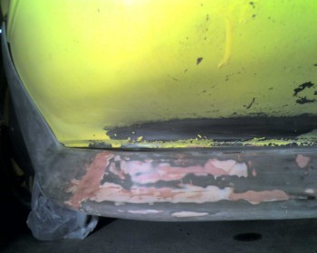 I sanded as much of the spoiler smooth as I had patience and energy for.  The rest was smoothed with filler which probably won't last forever, but it is the best I could do.