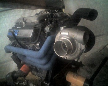 11-21-10_1009.jpg (242.3 KiB) Viewed 5225 times It took two tries to get this engine working right in the car. I bought it from the salvage yard for $60 with a 'blown head gasket' that was actually a blown-out LIMG. I didn't know that it had already spun the rear main bearing, so it developed no oil-pressure once warm. I pulled it out, and later re-built it into this.