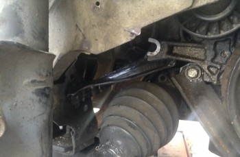 image3.JPG (1 MiB) Viewed 9778 times The rear-brace installed. I still want to fab-up a plate to distribute the force more evenly to the frame-rail, and the bolt isn't tightened down yet. I also want to rubber-isolate the plate to damp-down vibration.